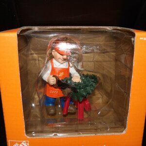 Homer HOME DEPOT 2012 Christmas Ornament NIB Man Cuts on Christmas Tree